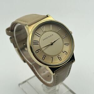 Anne Klein Women’s Gold-Tone Classic Leather Strap Watch – 36mm